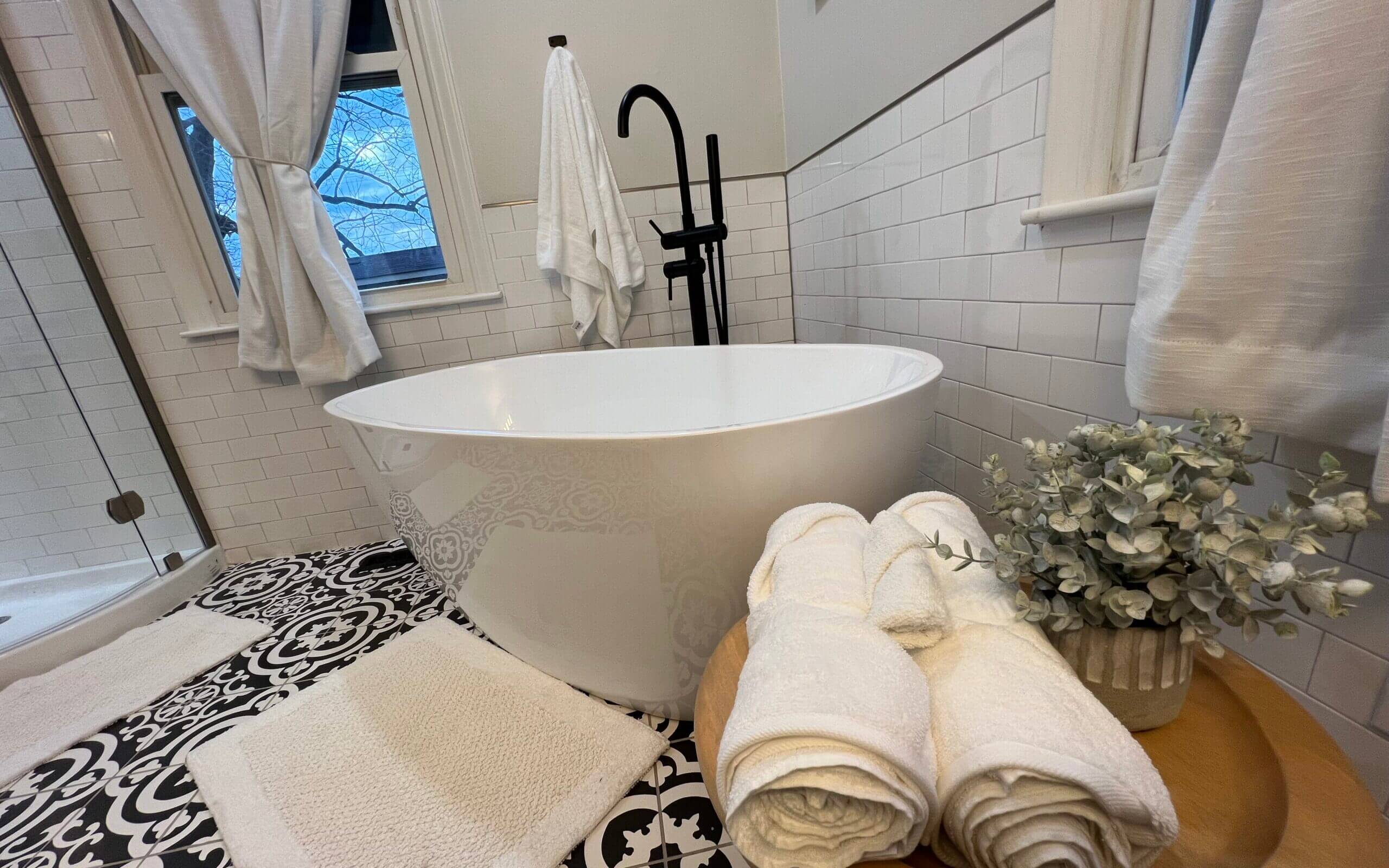 Luxury soaking tub with towels in Primary Bathroom in Kings Mountain North Carolina