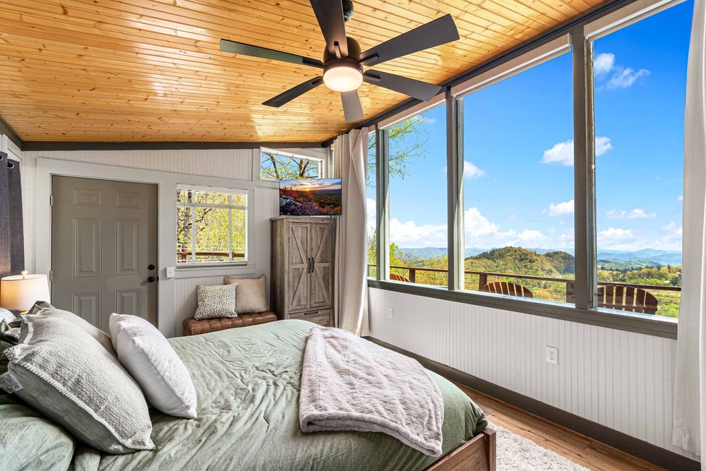 King bedroom with 100-mile mountain views at The Orchard