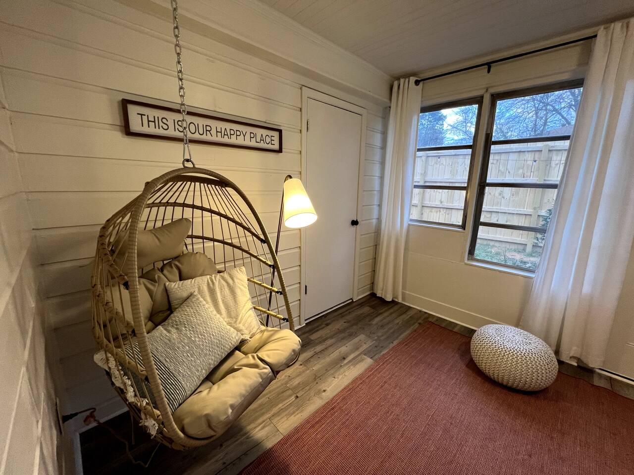 Hanging egg chair in the sunroom