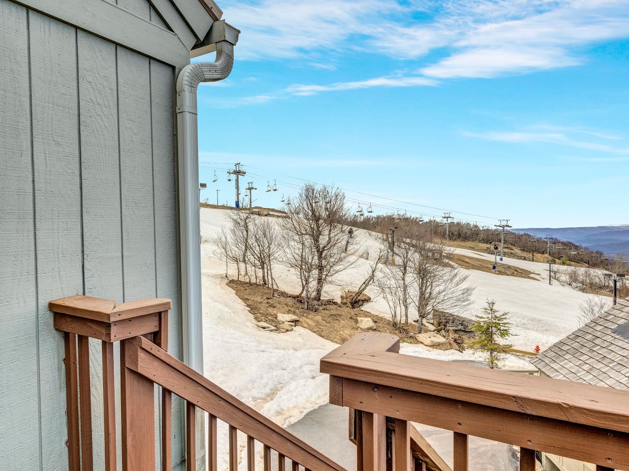 Ski slope and chairlift seen from the chalet deck