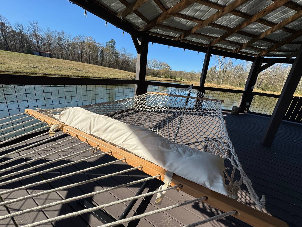Gazebo over the water with a hammock