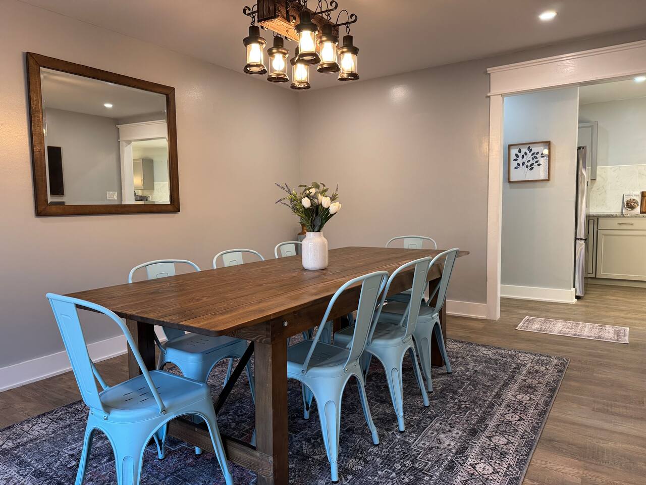 Main House dining room with a farm table seating eight