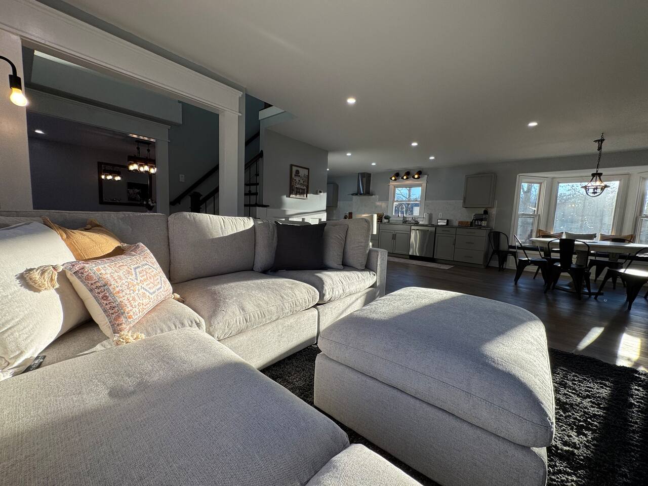 Main House living room sectional looking toward the kitchen