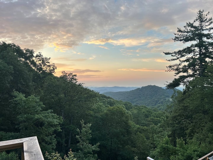 GeoDome interior with king bed under transparent roof