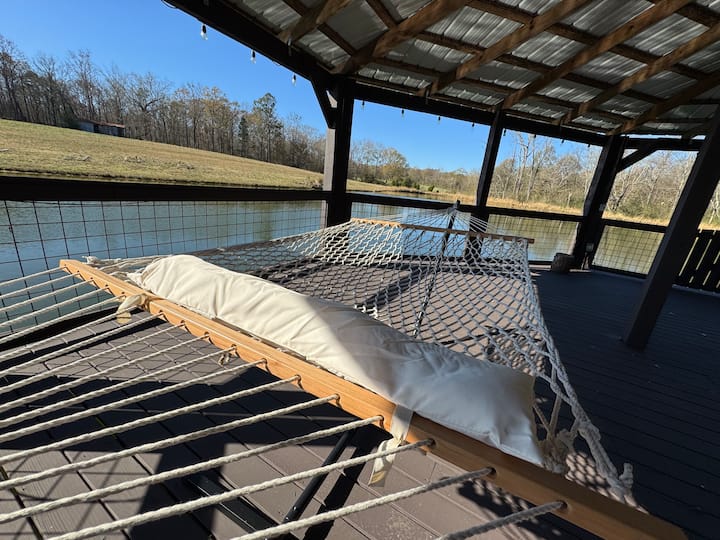 Pond gazebo with string lights